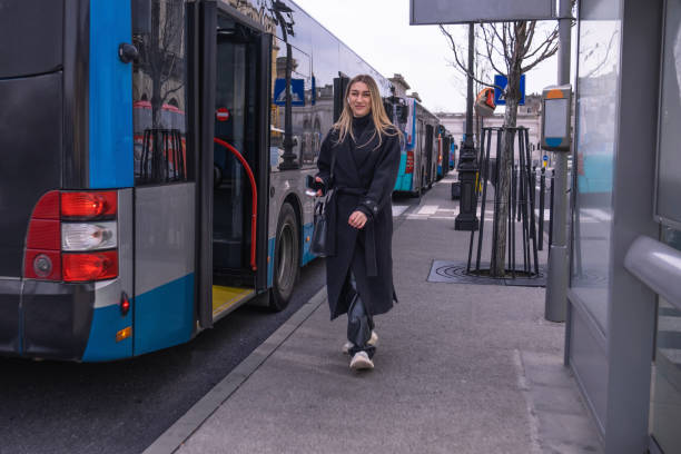 istock Woman taking the bus to University 1470983580