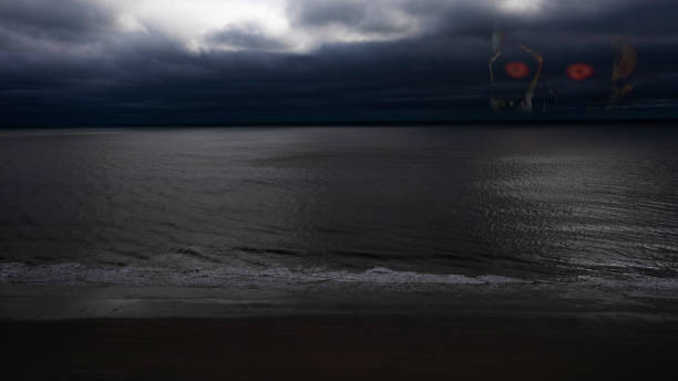 Skull on the horizon in an approaching storm