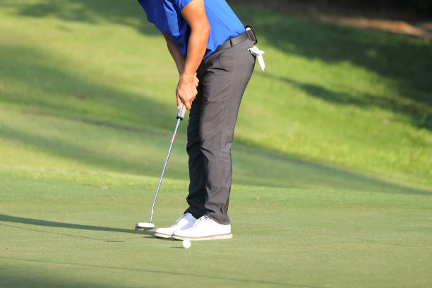 istock Young male golfer player on golf course 1470984066