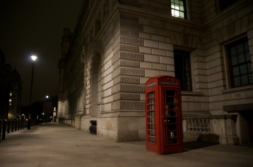 a lonely phone booth at the mid in the center of london