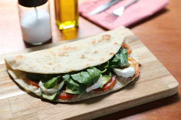 istock Italian cuisine , Piadina with tomatoes and cheese 1470986167