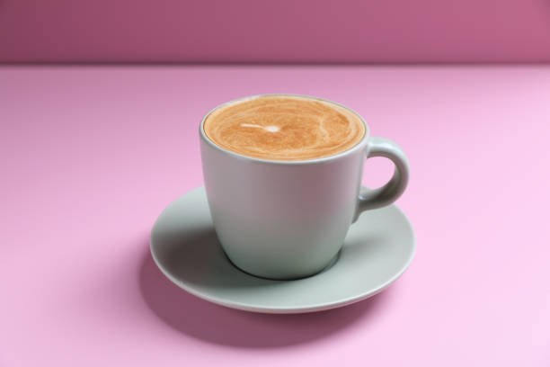 istock hot cappuccino with latte art isolated in pink background 1470986278