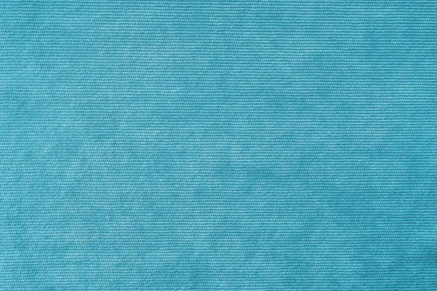 fond de texture de tissu d’ameublement en velours turquoise. - velours photos et images de collection