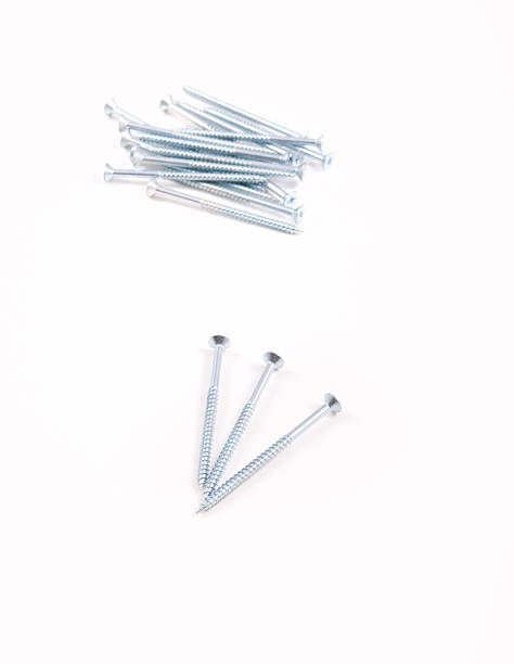istock Zinc plated screws on white background 147098734