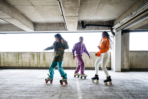 Professional roller skaters showing their moves in practice