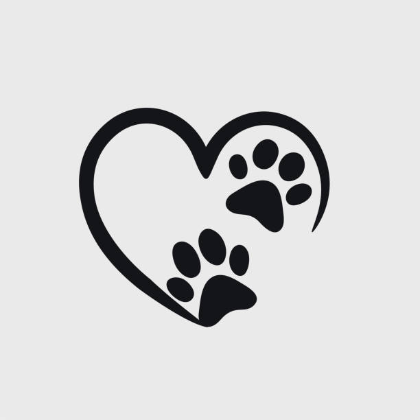 animal love symbol paw print with heart, isolated vector - dogs stock illustrations