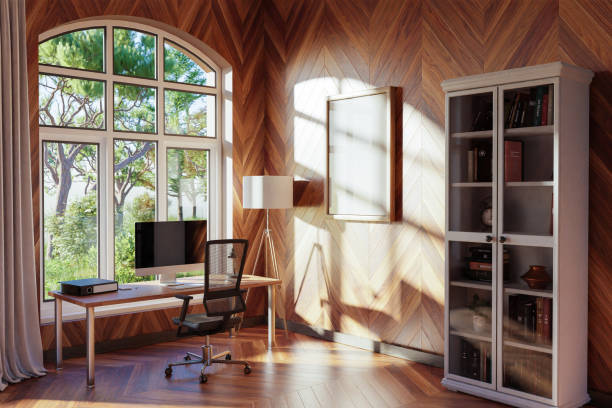 istock comfortable workplace with pc standing on wooden desk in office at home; bright sunlight shines from side through large window; wall with canvas copy space;  remote work freelance concept; 3D Illustration 1470996753