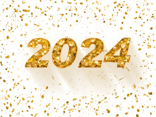 Nouvel An brillant: mot 2024 à côté de particels d’or - Photo