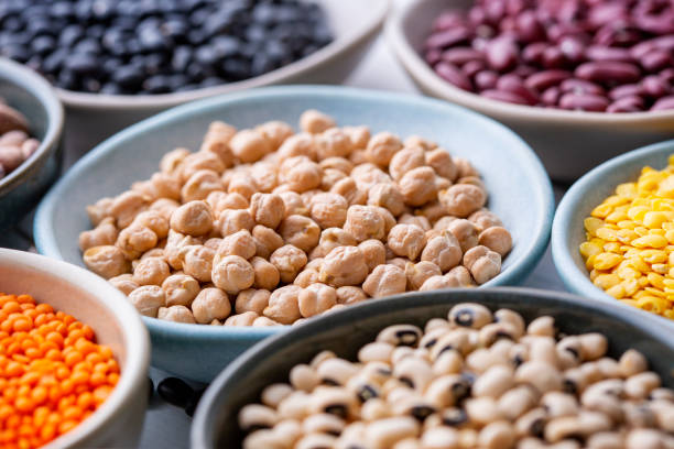istock Different types of legumes in bowls - chick-peas 1471002083