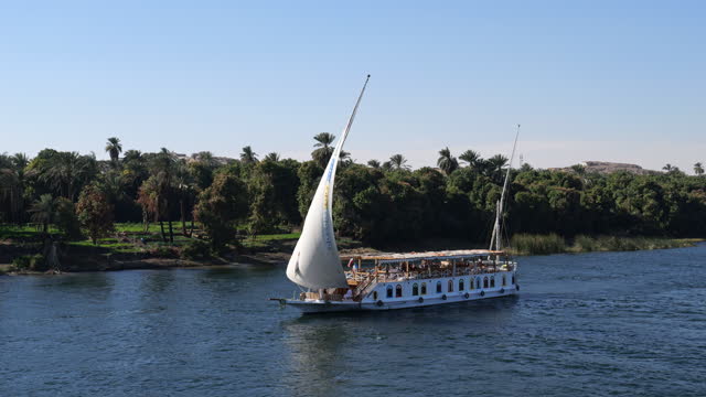 Cruise ships on the river Nile between Luxor and Aswan, upper Egypt.