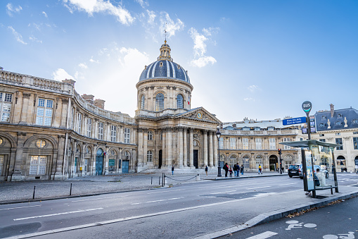 Facade of the Institut de France building on the Quai de Conti in Paris, France