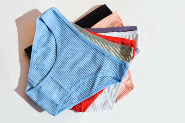 istock women's underpants. comfortable underwear. cotton. background for the design. 1471003873