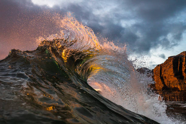 istock Powerful ocean waves erupting in early morning golden light 1471013738