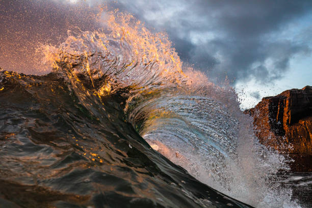 istock Powerful ocean waves erupting in early morning golden light 1471013750