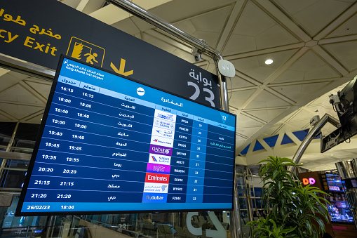 Riyadh, Saudi Arabia - February 26, 2023 : A flight information board at the King Khalid International Airport in Riyadh, Saudi Arabia.