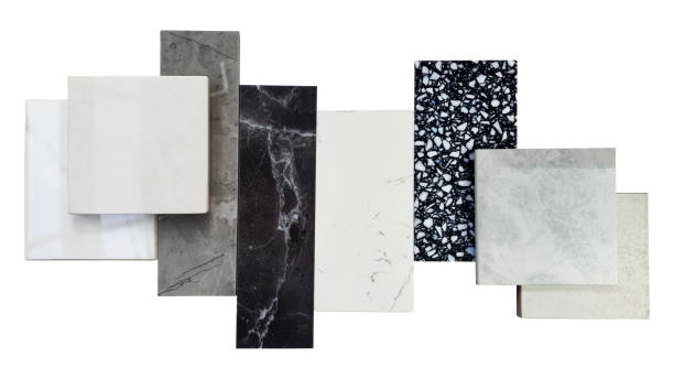 istock close up of interior premium stone  samples including black marble, grey artificial stone, terrazzo tiles placed with floor tiles. counter top samples isolated on background with clipping path. 1471015483