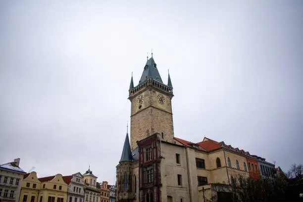 Prague old town hall tower in historic square view from below