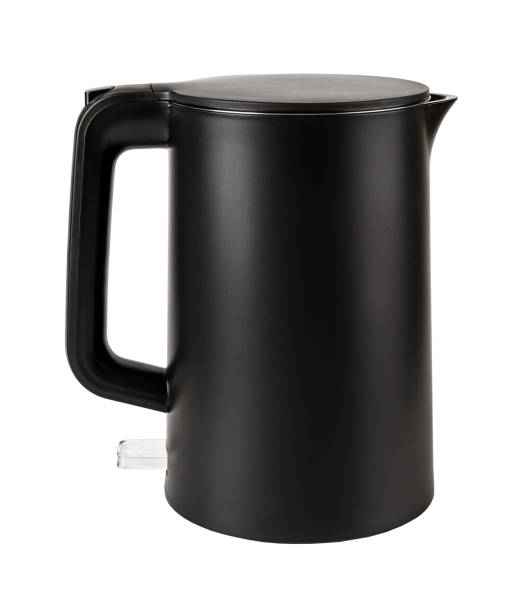 istock Stylish electric kettle cutout. Matte black kettle isolated on a white background. Kitchen equipment for boiling water. Household electric appliances concept. 1471028958