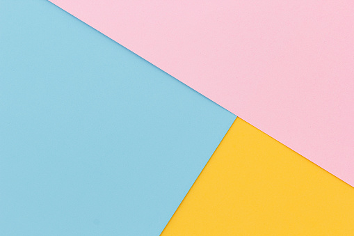 Pink, blue and yellow color paper background