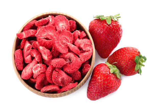 istock Sweet sublimated and fresh strawberries on white background, top view 1471046804
