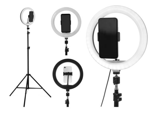 istock Set of ring lights with smartphones on white background 1471047539