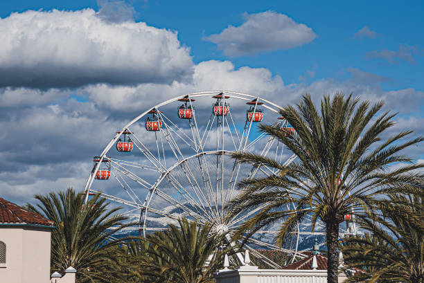 istock Ferris wheels and snowy mountain 1471050100