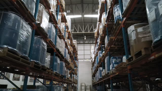 Moving in large warehouse logistics terminal.