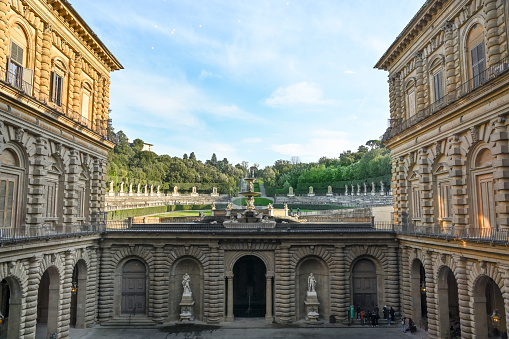 Paris, France- April 10, 2010: Paris is the center of French economy, politics and cultures and the top travel destinations in the globe.  It attracts the tourists all over the world.  Here is the garden inside Chateau de Versailles.