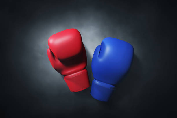 Red boxing gloves isolated on white.