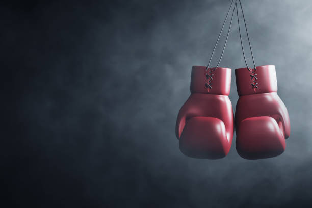 istock Red boxing gloves hanging 3d illustration 1471064295