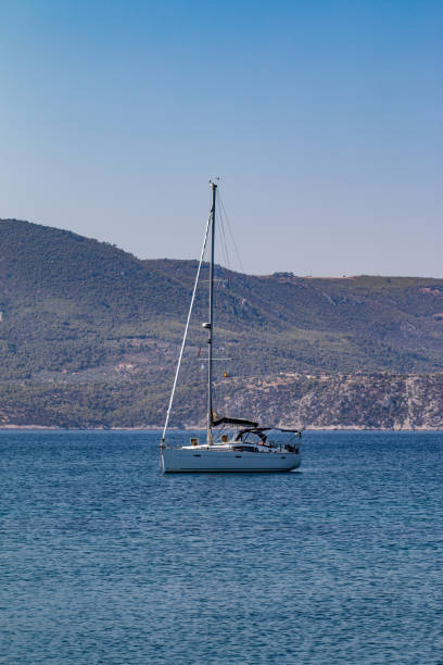 istock Modern yachts floating on blue sea 1471066150