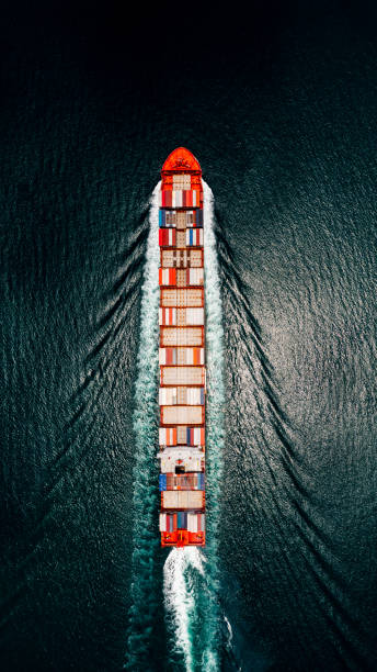 istock container ship sailing fulll speed to transport goods in containers for import export internationally and worldwide, business services transportation by container ship open sea, aerial top view 1471067382