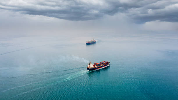 istock two container ship carrying container box global business delivery service cargo by freight shipping commercial trade logistic and transportation over sea worldwide rainstrom background 1471067419