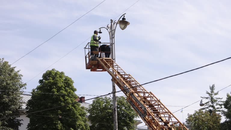 repair street lamp, crane lifted, light bulb,