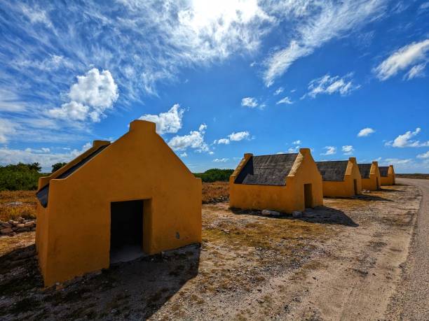 istock Yellow Slave huts in Bonaire 1471072297
