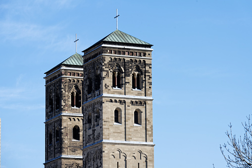 The two towers of the parish church of St. Heribert in the (neo)romanesque style in cologne deutz