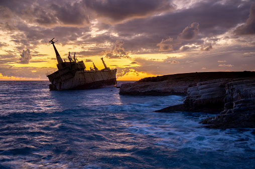 Sunset view of the Edro III shipwreck on the coast of Coral Bay close to Peyia, Paphos, Republic of Cyprus