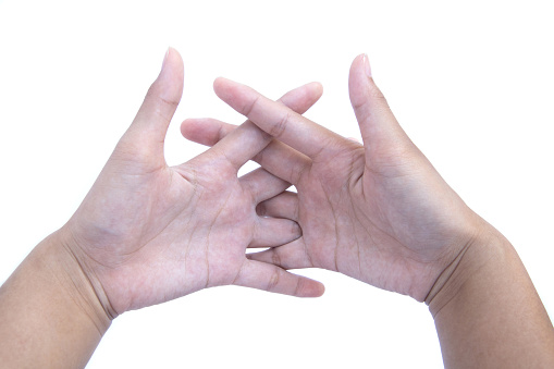 Fingers interlocking on both sides hands . isolated on white background