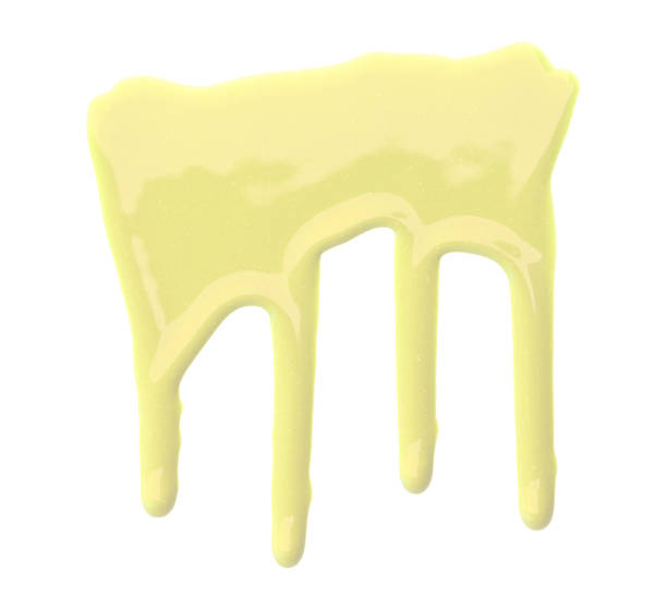 istock Light yellow color with pigment flowing down. Isolated on white background. 1471079771