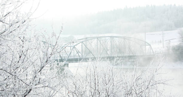 Early Winter Morning With Trestle Bridge And Misty River
