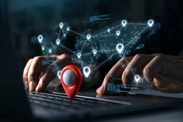 istock Young man using laptop with Blue markers with user icons on the map 1471093929