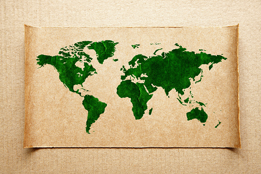 World Map on brown paper background.