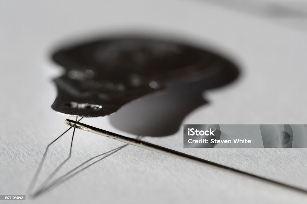 Sewing Needle Threader Tool In Use And A Single Black String Stock Photo -  Download Image Now - iStock