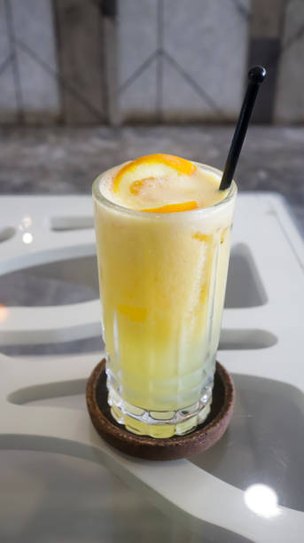 istock Ice squeezed orange or orange juice in a tall glass at the table 1471104546