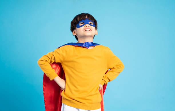 istock The image of a boy wearing a cape transforms into a hero 1471107564
