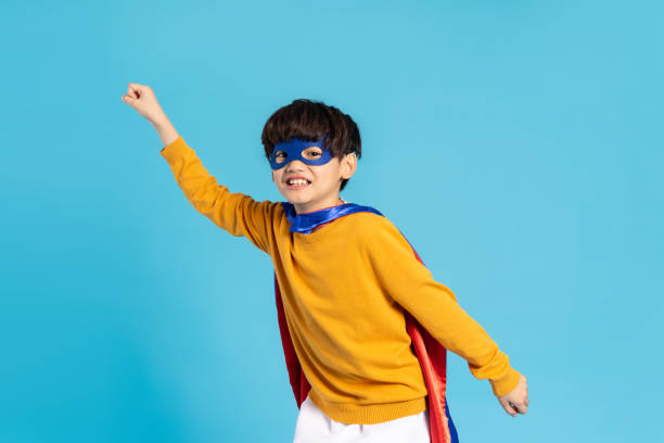 istock The image of a boy wearing a cape transforms into a hero 1471107566