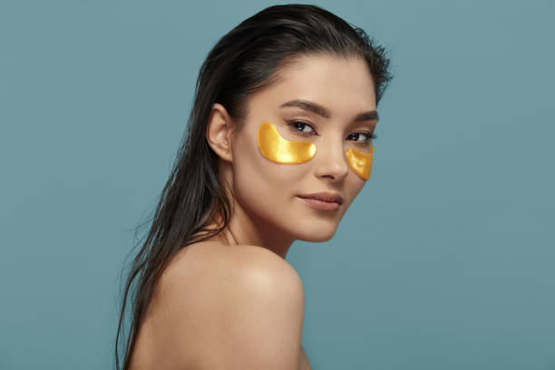 istock Pretty girl face with hydrating under eye patches. 1471117059