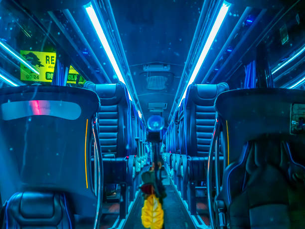 istock Interior of empty tourist bus at a night stop. View through the dirty windshield 1471123810