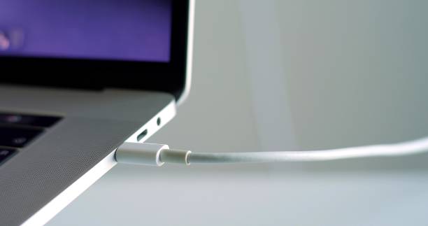 istock Close up charging USB-C power connection to laptop 1471125255