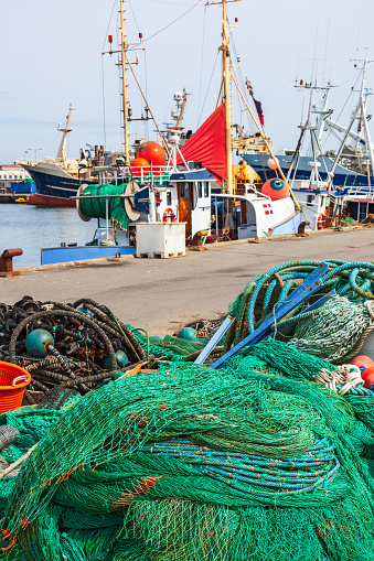 Fishing nets on the quay at a fishing village